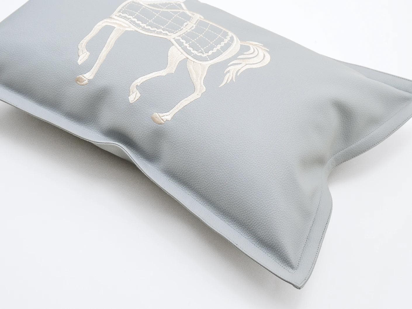 Filip Matisse cushion in blue and white, shown in a product top view as image 8