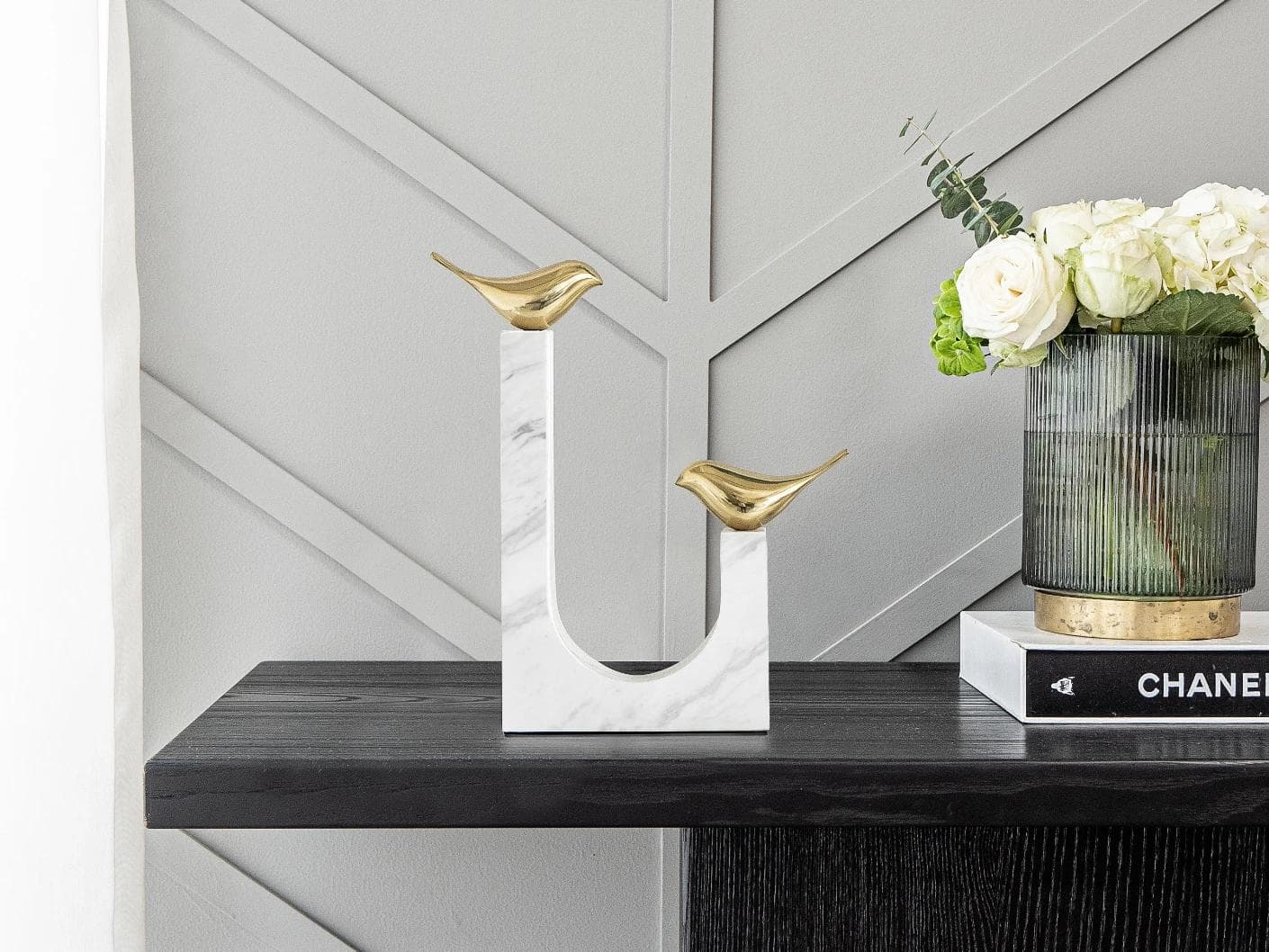 Finch Butterfield statues and sculptures in white and gold, shown in a lifestyle front view as image 2