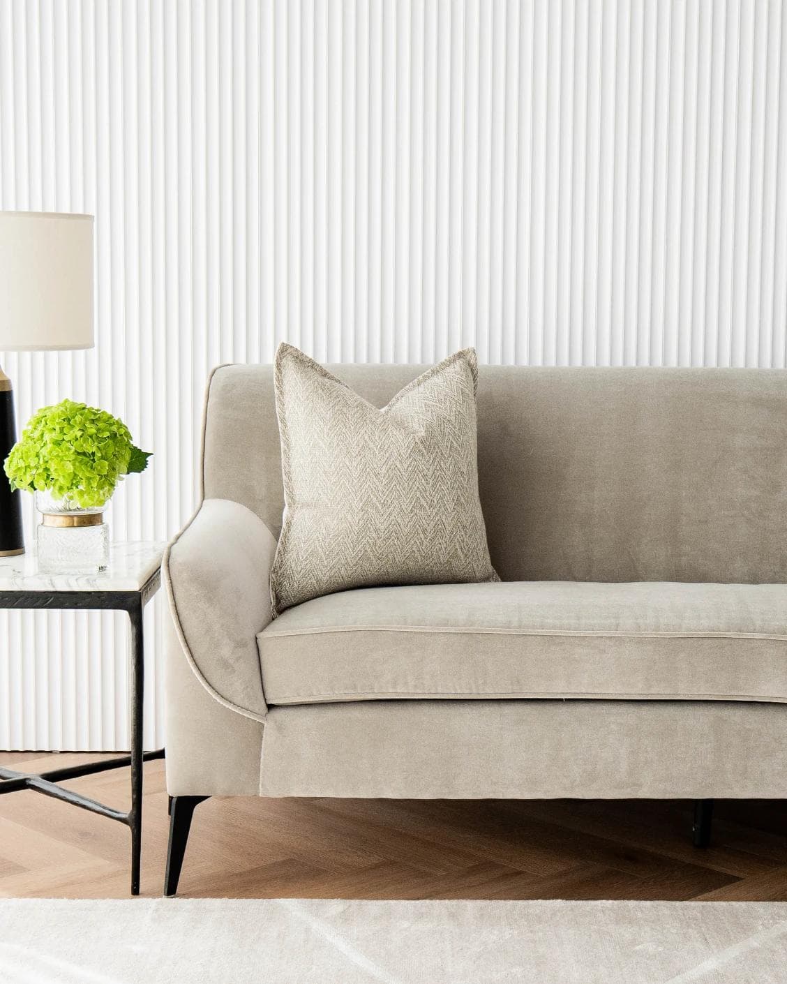 Fleur Bianca cushion in beige, shown in a lifestyle front view as image 4