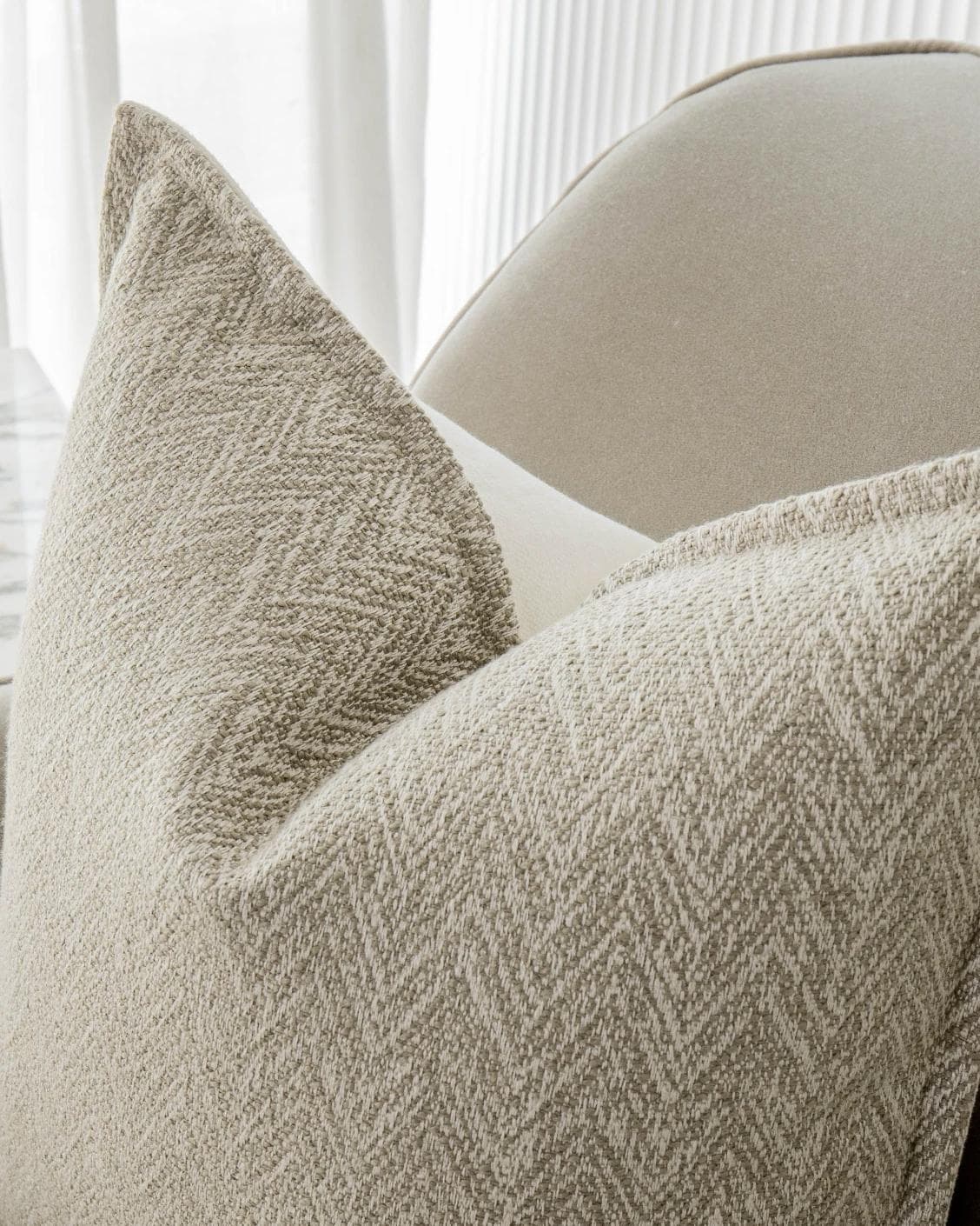 Fleur Bianca cushion in beige, shown in a lifestyle top view as image 5