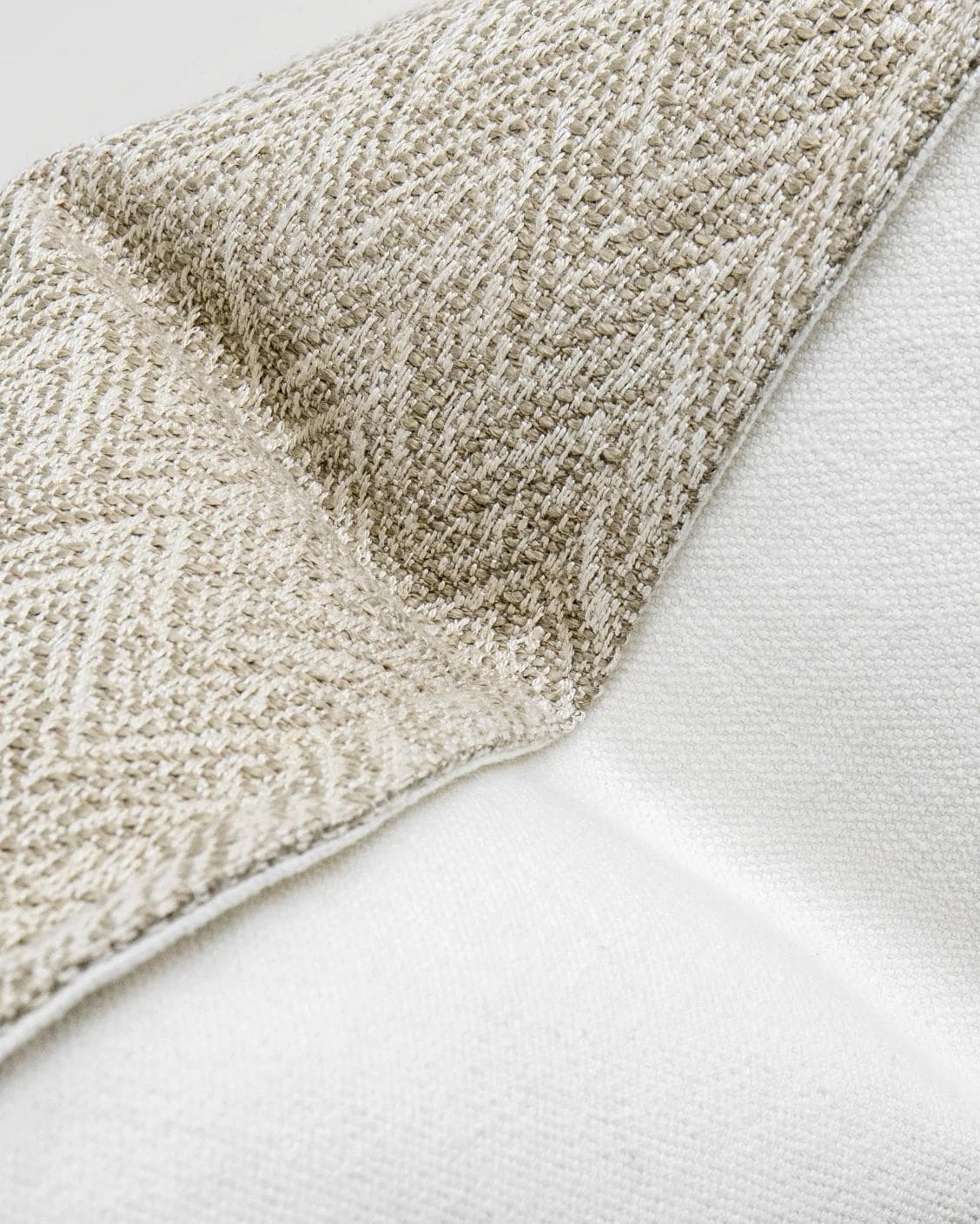 Fleur Bianca cushion in beige, shown in a product close-up as image 3