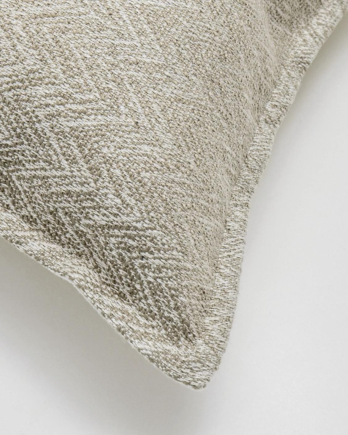 Fleur Bianca cushion in beige, shown in a product top view as image 2