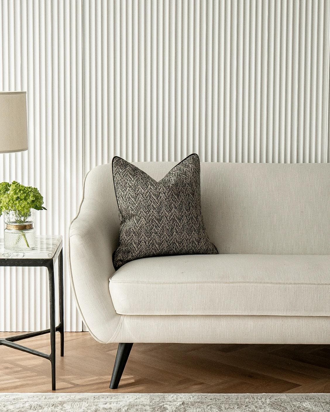 Fleur Steele cushion in black and white, shown in a lifestyle front view as image 4