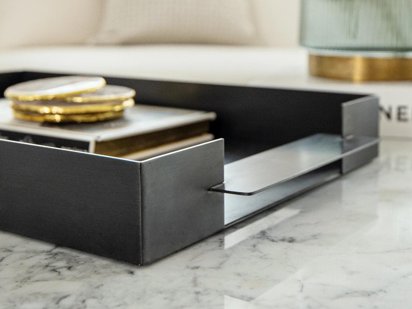 Frank Bandiagara trays in grey, shown in a lifestyle close-up as image 2