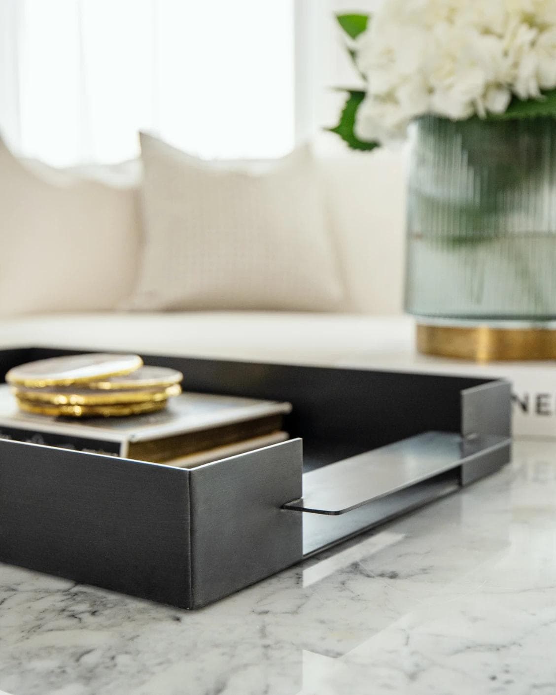 Frank Bandiagara trays in grey, shown in a lifestyle close-up top view as image 4