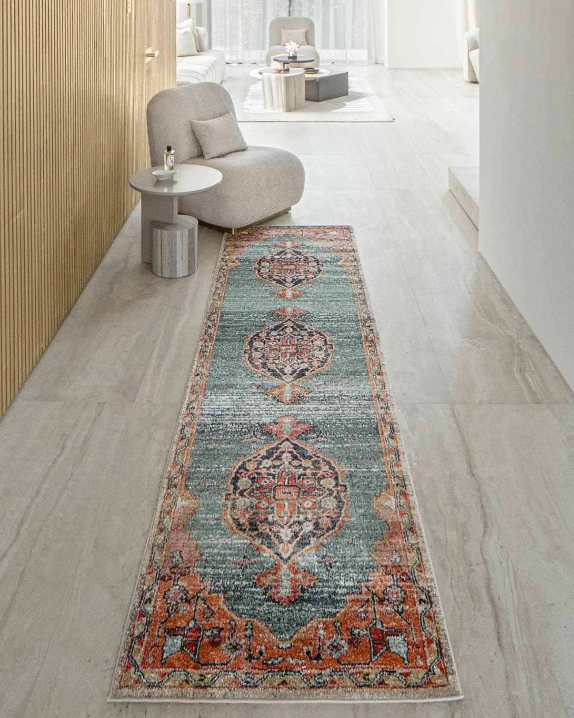 Frank Tiger Runners carpet in blue, orange and multicolour, shown in a lifestyle front view