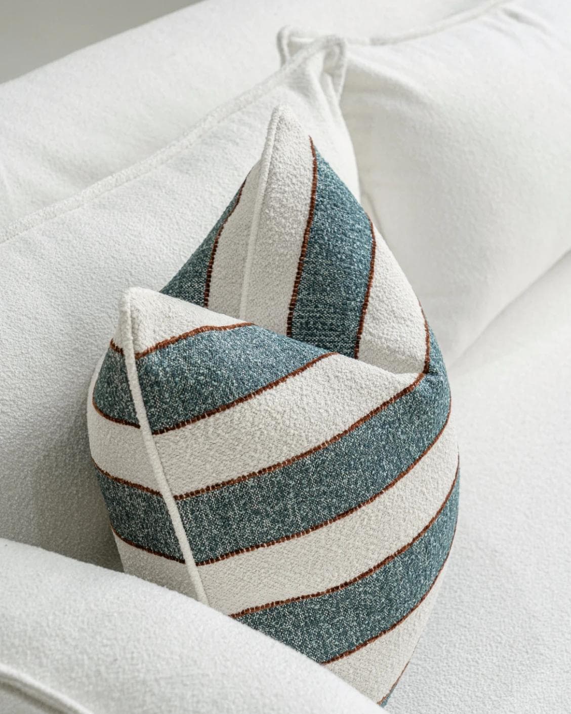 Gia Canova cushion in blue, shown in a lifestyle top view as image 5