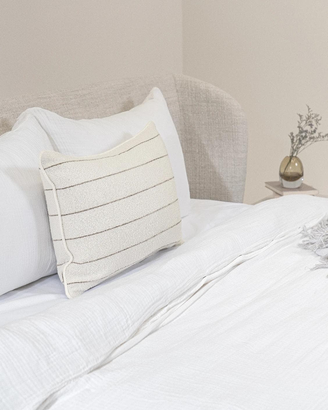 Gia Laurent III cushion in ivory, shown in a lifestyle left view as image 4