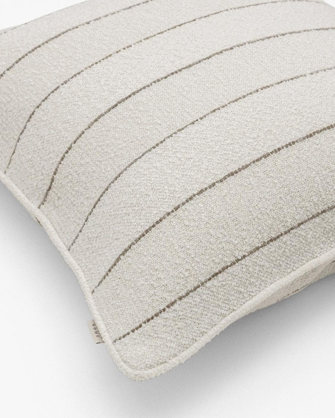 Gia Laurent III cushion in ivory, shown in a product close-up left view as image 6