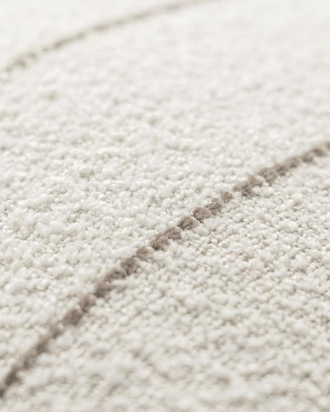 Gia Laurent III cushion in ivory, shown in a product close-up left view as image 8