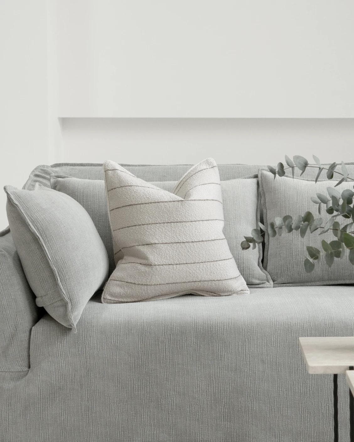 Gia Laurent cushion in ivory, shown in a lifestyle front view as image 4