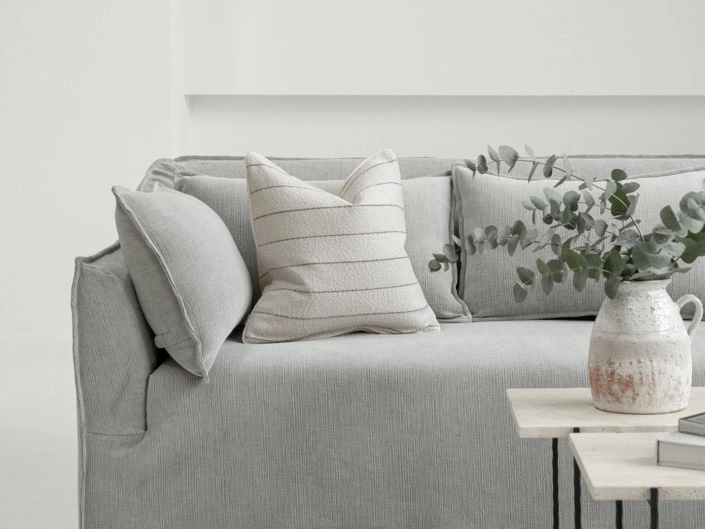 Gia Laurent cushion in ivory, shown in a lifestyle front view as image 4