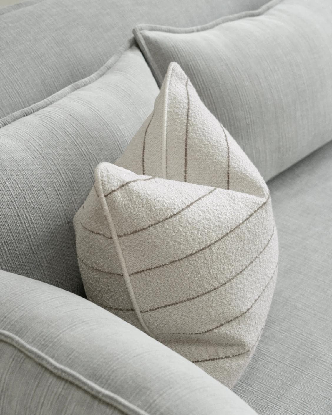 Gia Laurent cushion in ivory, shown in a lifestyle top view as image 5