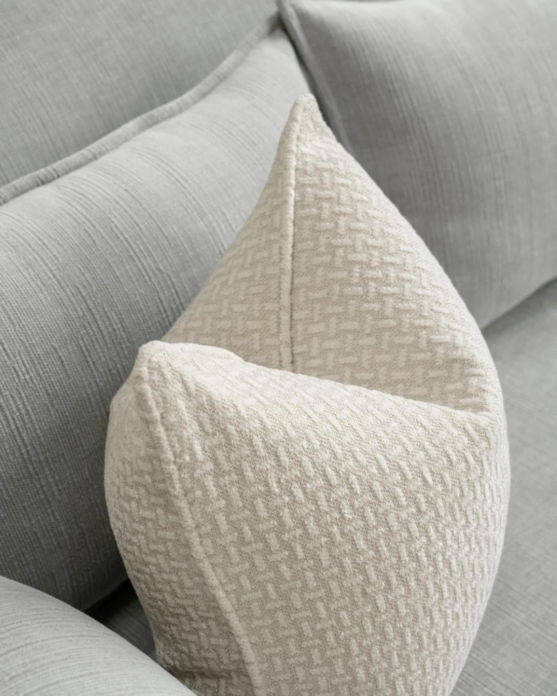 Gigi Laurent cushion in ivory, shown in a lifestyle top view as image 5