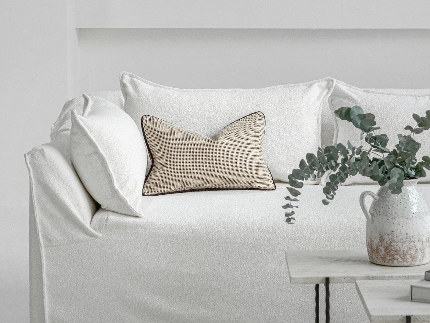 Ginny Laurent II cushion in cream, shown in a lifestyle front view as image 4