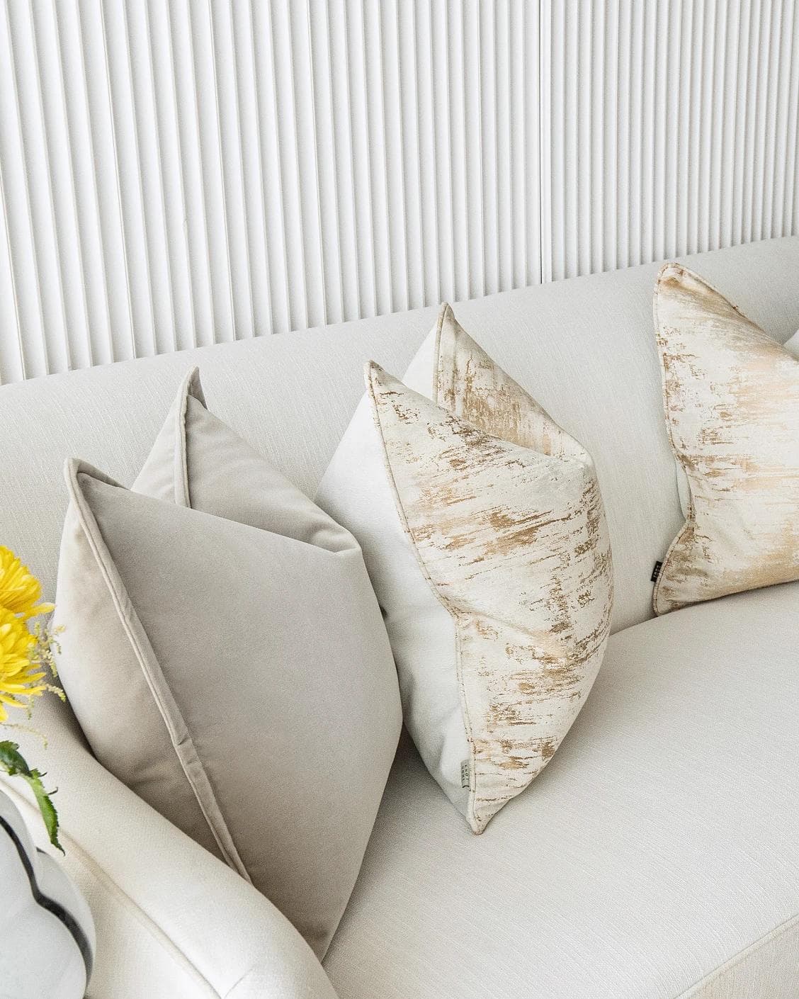 Goldea Bundle cushion in grey, yellow and silver, shown in a lifestyle left view as image 9