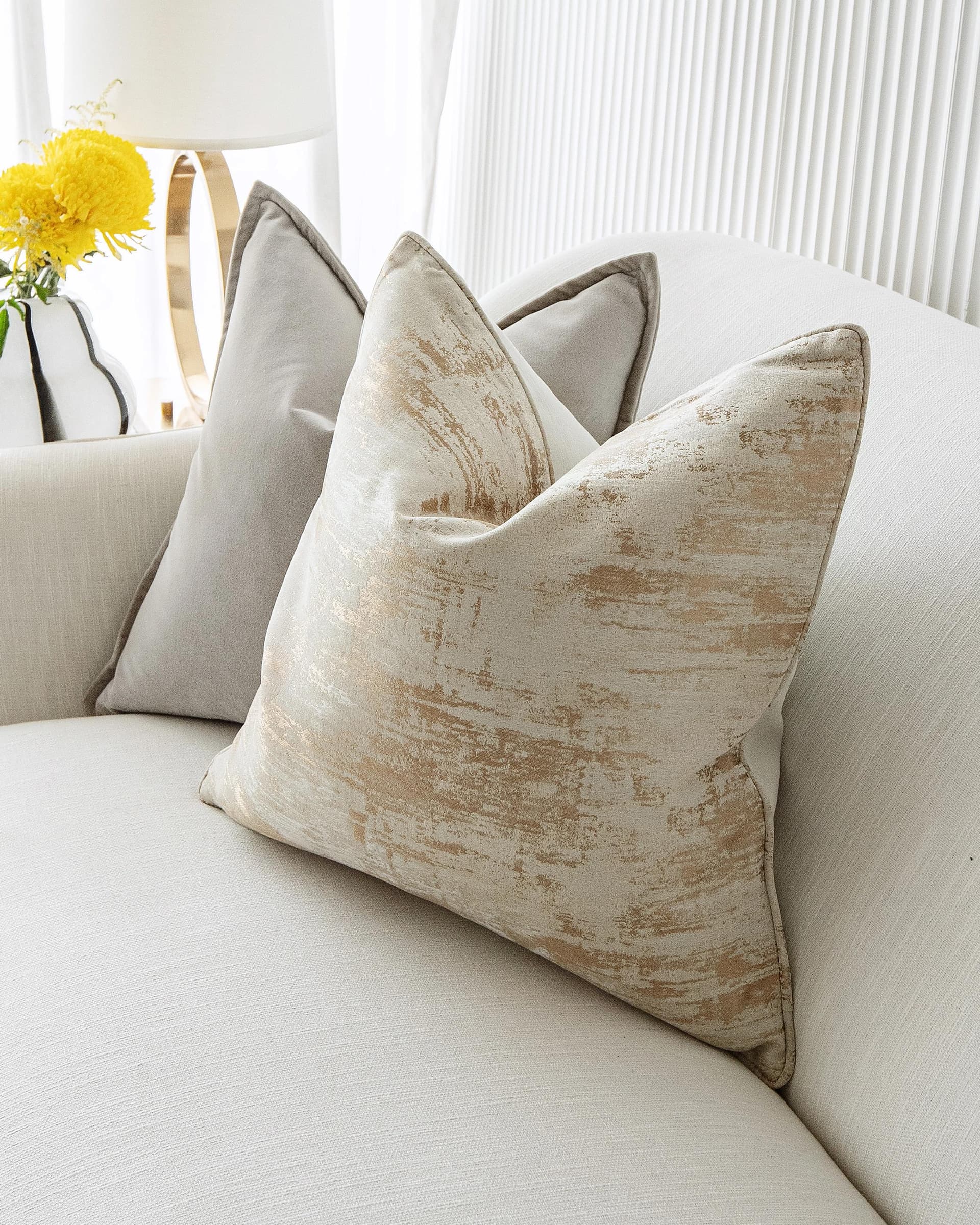 Goldea Bundle cushion in grey, yellow and silver, shown in a lifestyle right view as image 11