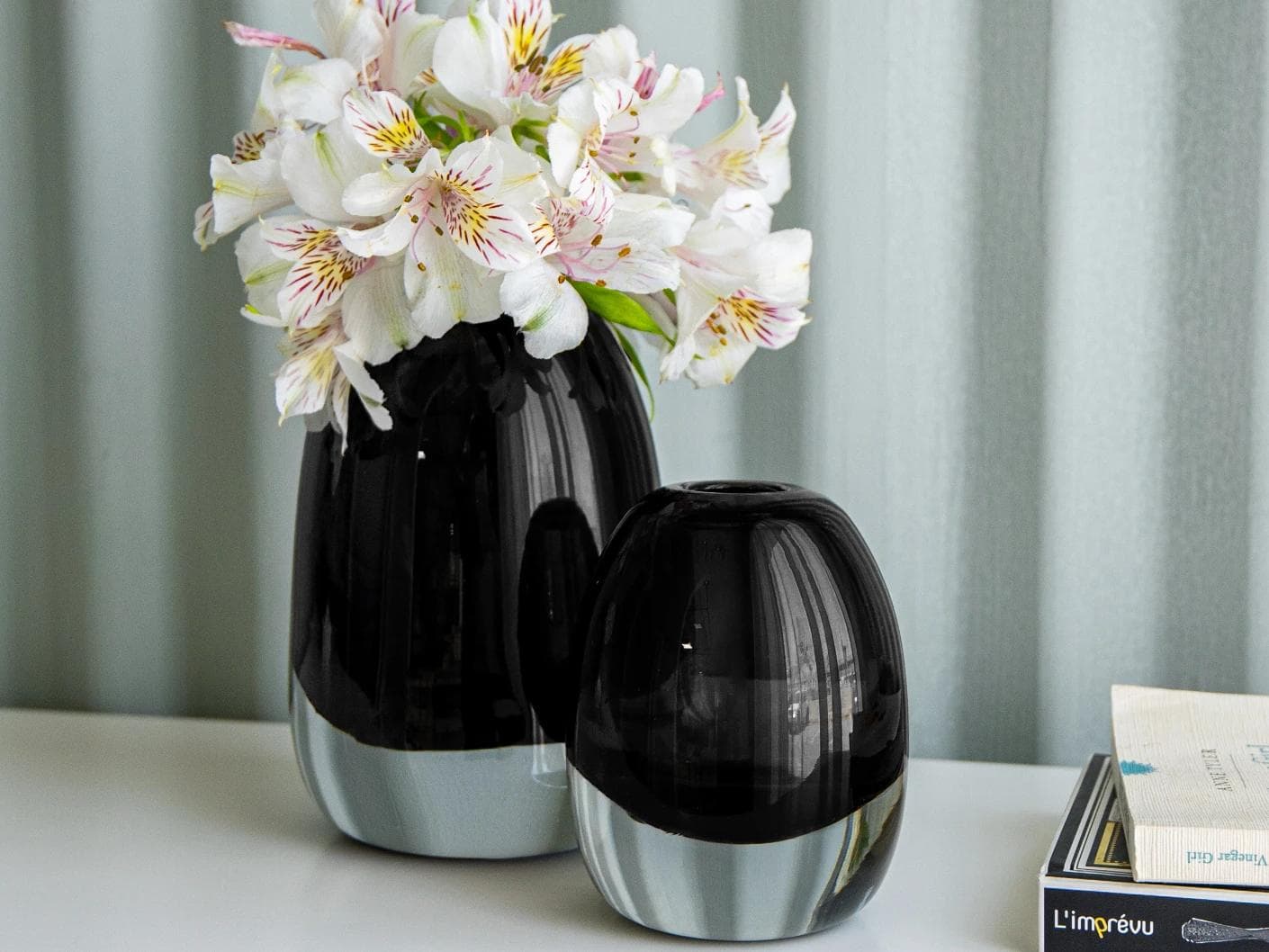 Gracey Storms vases in grey, shown in a lifestyle right view as image 2