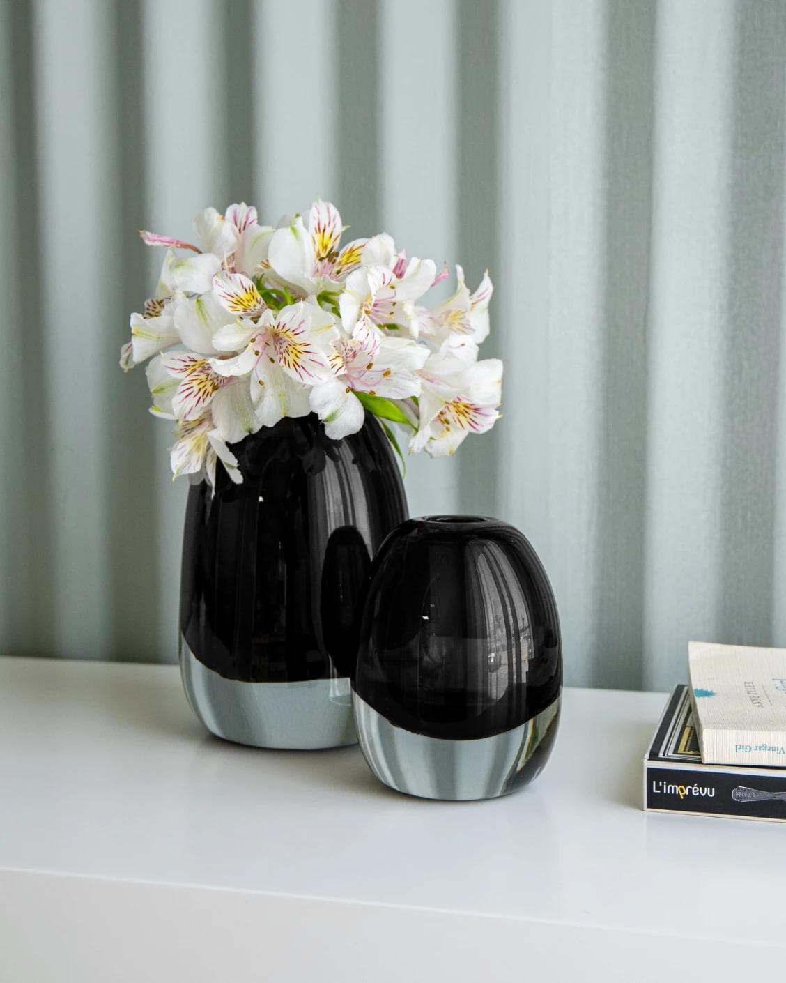 Gracey Storms vases in grey, shown in a lifestyle right view as image 2