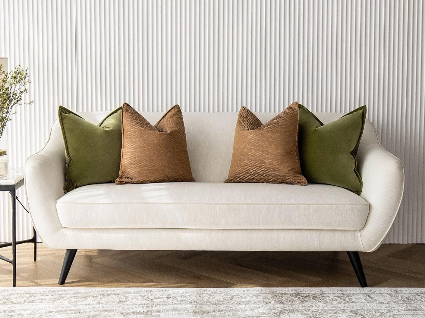 Octavia Bundle bundle - indoor in green and orange, shown in a lifestyle front view as image 1