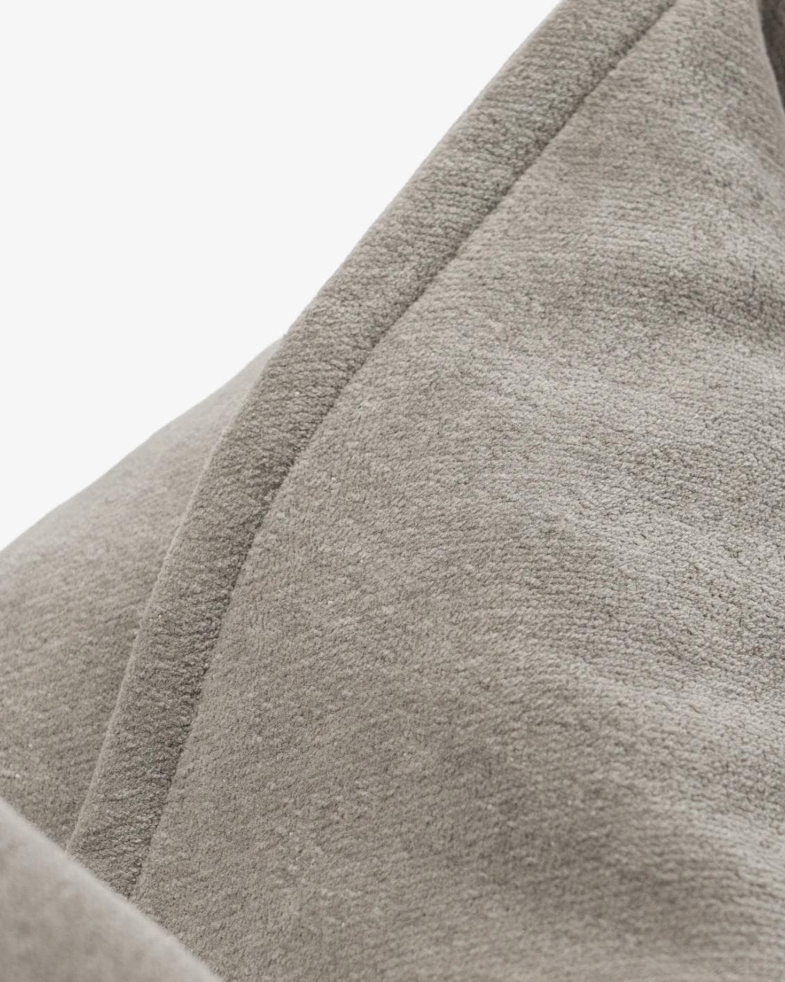 Haley Laurent cushion in grey and taupe, shown in a product close-up as image 7