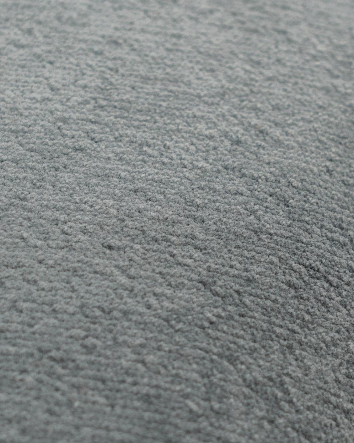 Haley Lucas cushion in azure and grey, shown in a product close-up as image 6