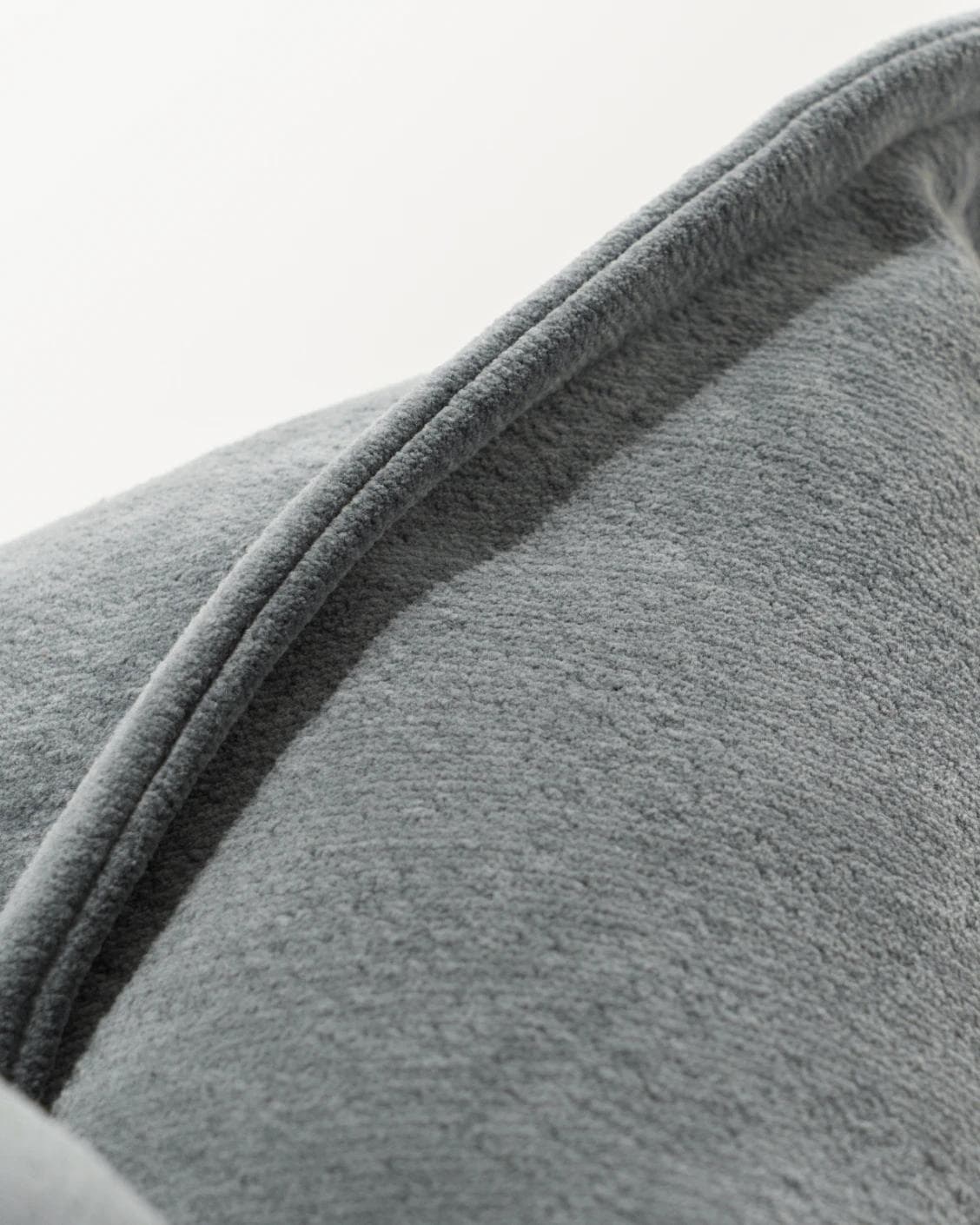 Haley Lucas cushion in azure and grey, shown in a product close-up as image 7