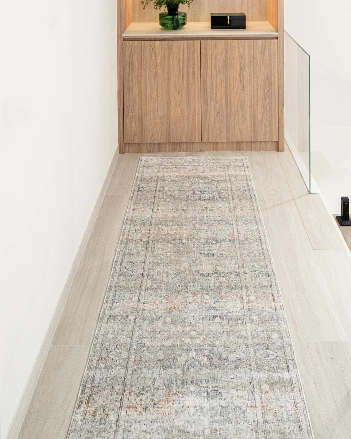 Hana Dune Runners carpet in beige and rust, shown in a lifestyle front view