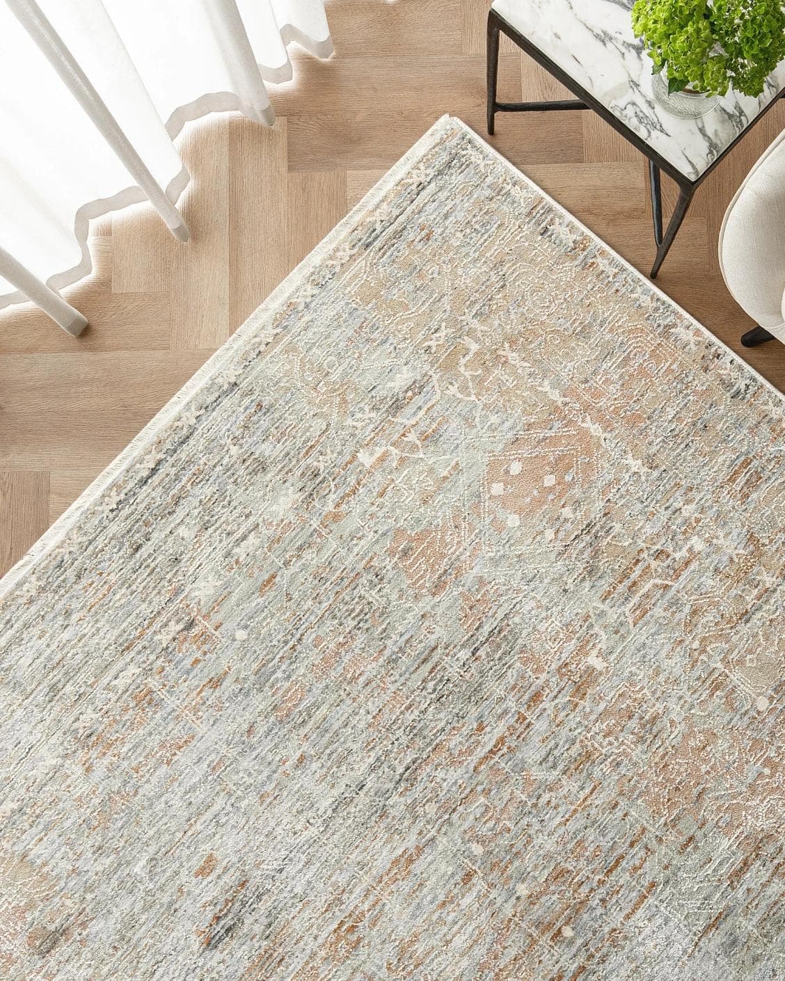 Hana Goldberg carpet in gold, shown in a lifestyle top view as image 2