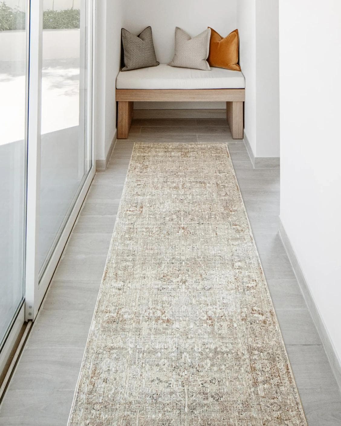 Hana Sandy Runners carpet in beige and taupe, shown in a lifestyle front view