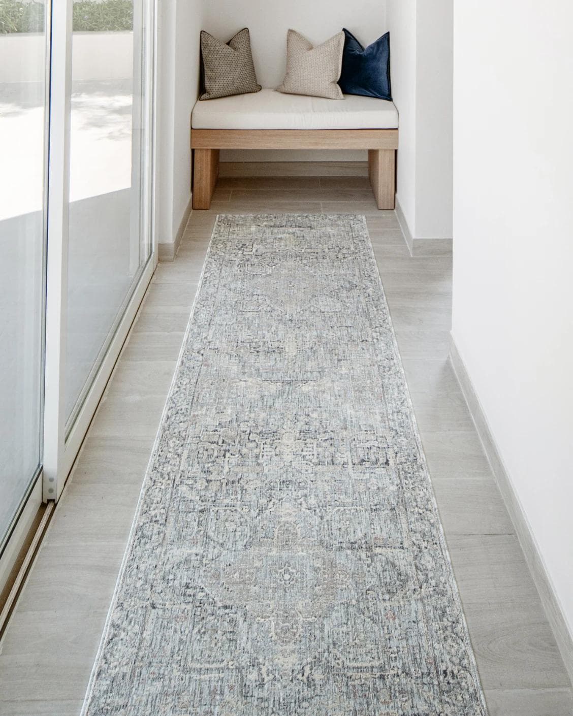 Hana Sky Runners carpet in blue and grey, shown in a lifestyle front view