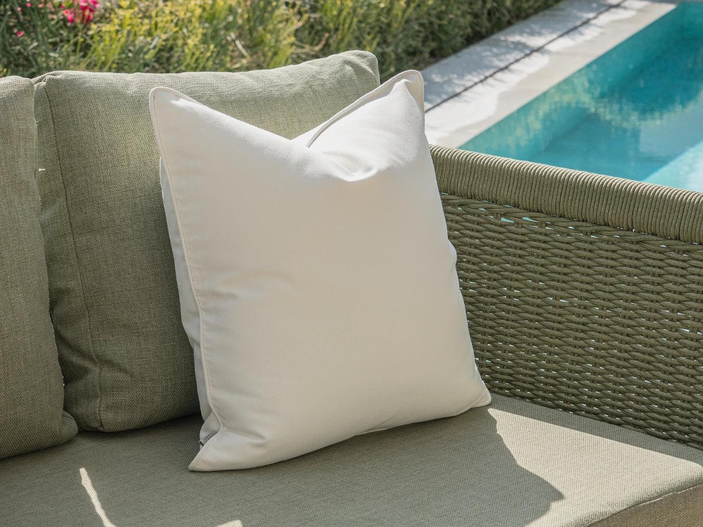Haneen Bundle cushion in rust and ivory, shown in a lifestyle left view as image 6