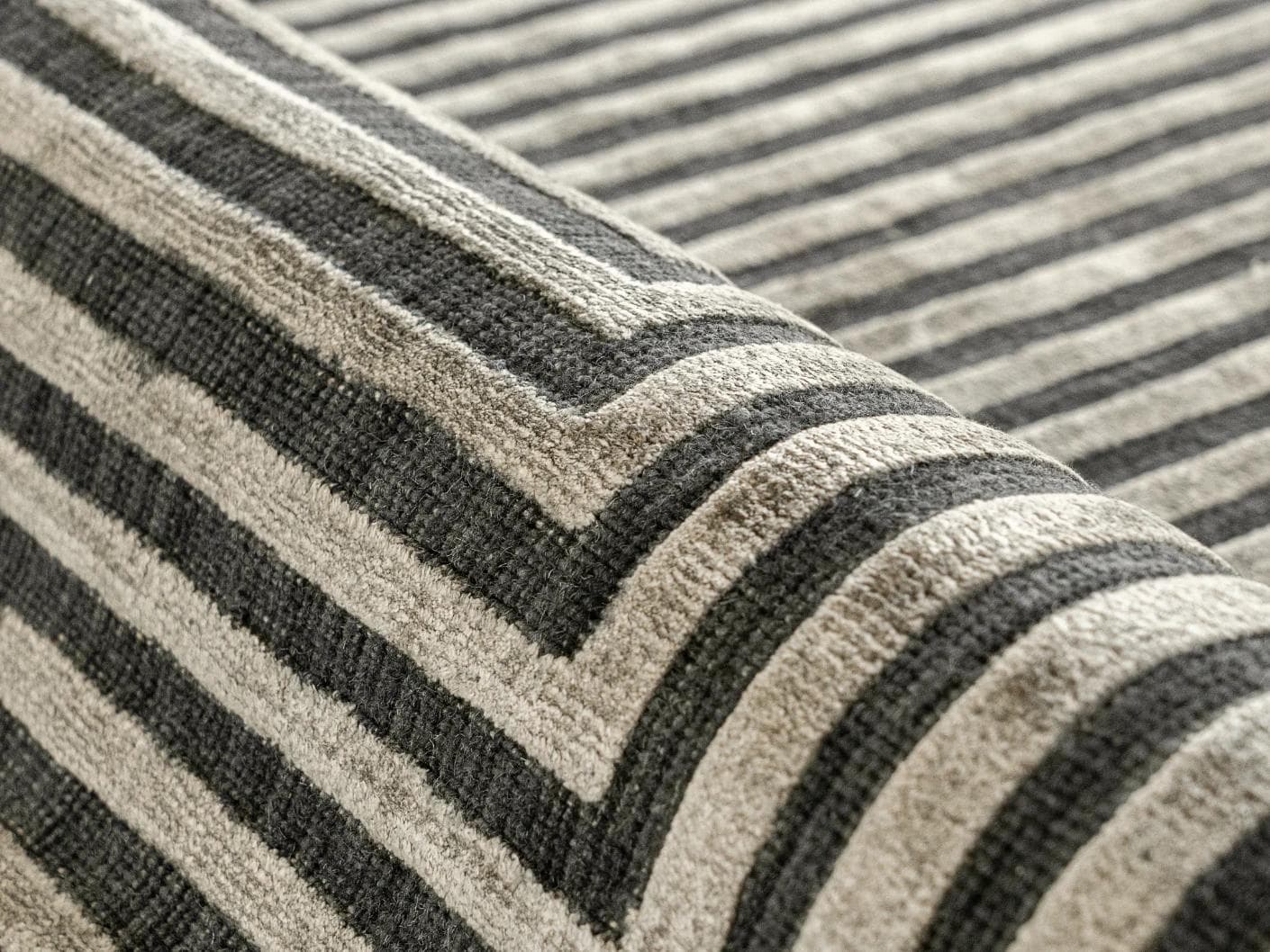 Harf Noon Ebony carpet in charcoal, shown in a product close-up as image 9