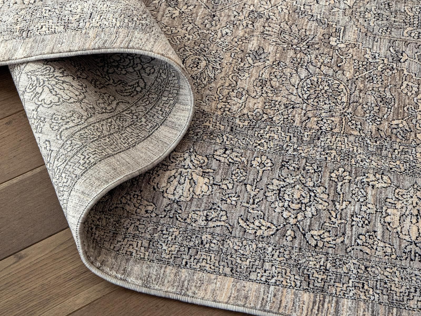Harper Ashton carpet in grey, shown in a lifestyle top view as image 9