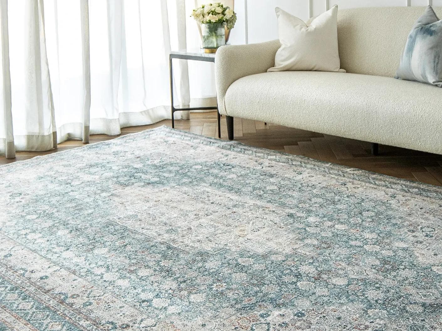 Harper Sky carpet in blue, shown in a lifestyle right view as image 5