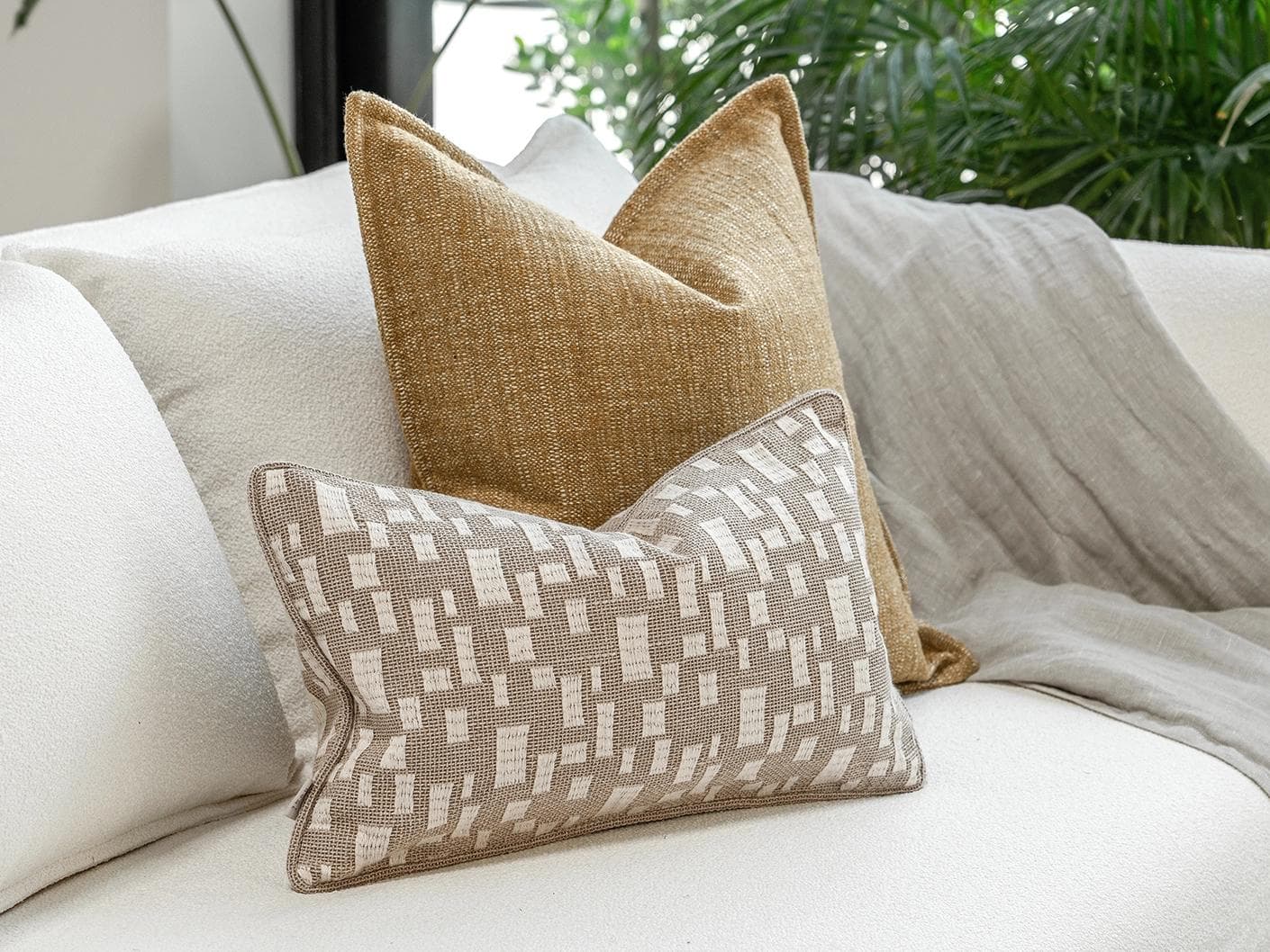 Hash Bundle cushion in beige and yellow, shown in a lifestyle left view as image 5