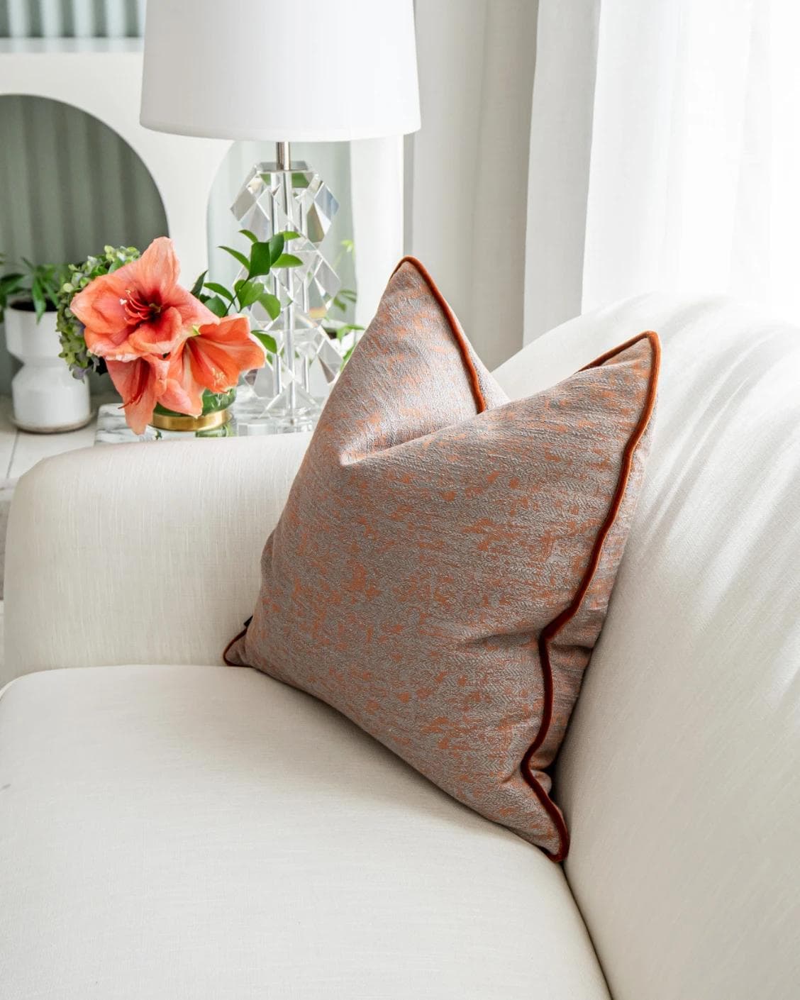 Hazel Tangelo cushion in orange and red, shown in a lifestyle right view as image 7