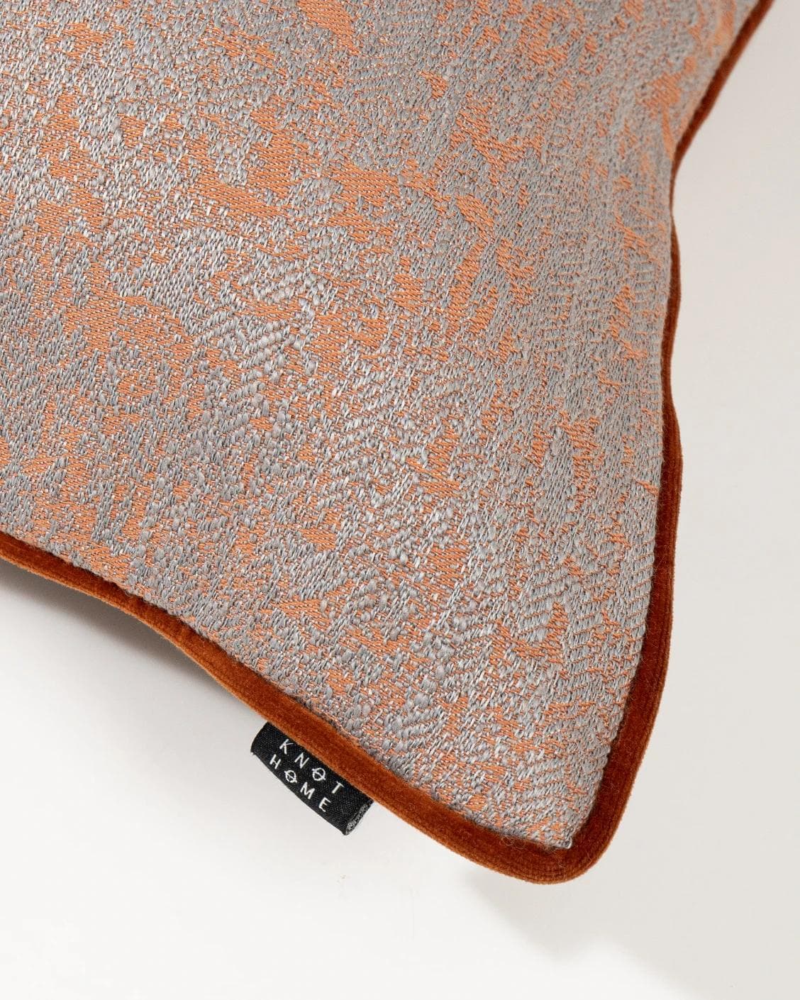 Hazel Tangelo cushion in orange and red, shown in a product top view as image 9