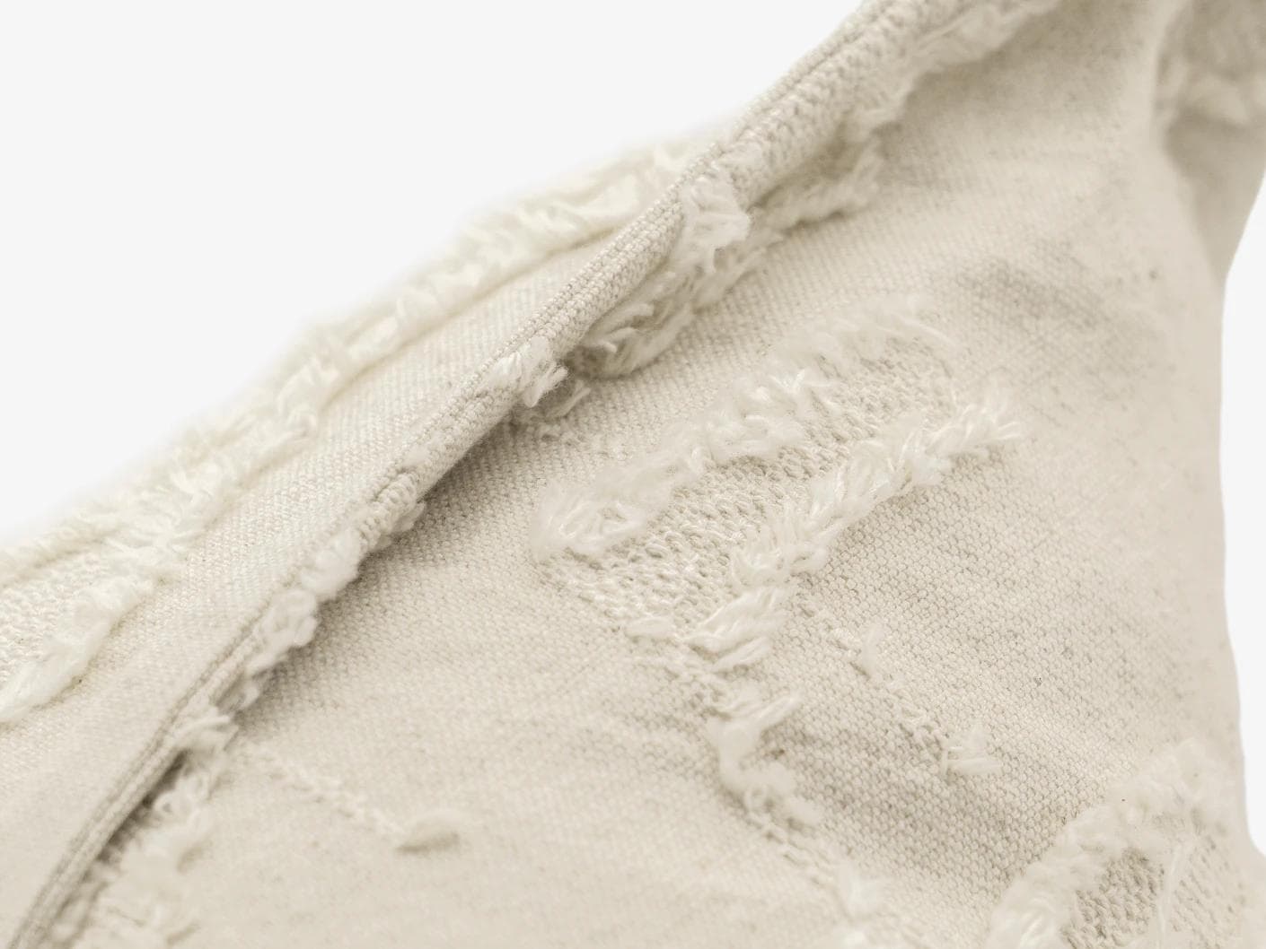 Heeth Laurent cushion in cream and ivory, shown in a product close-up as image 7