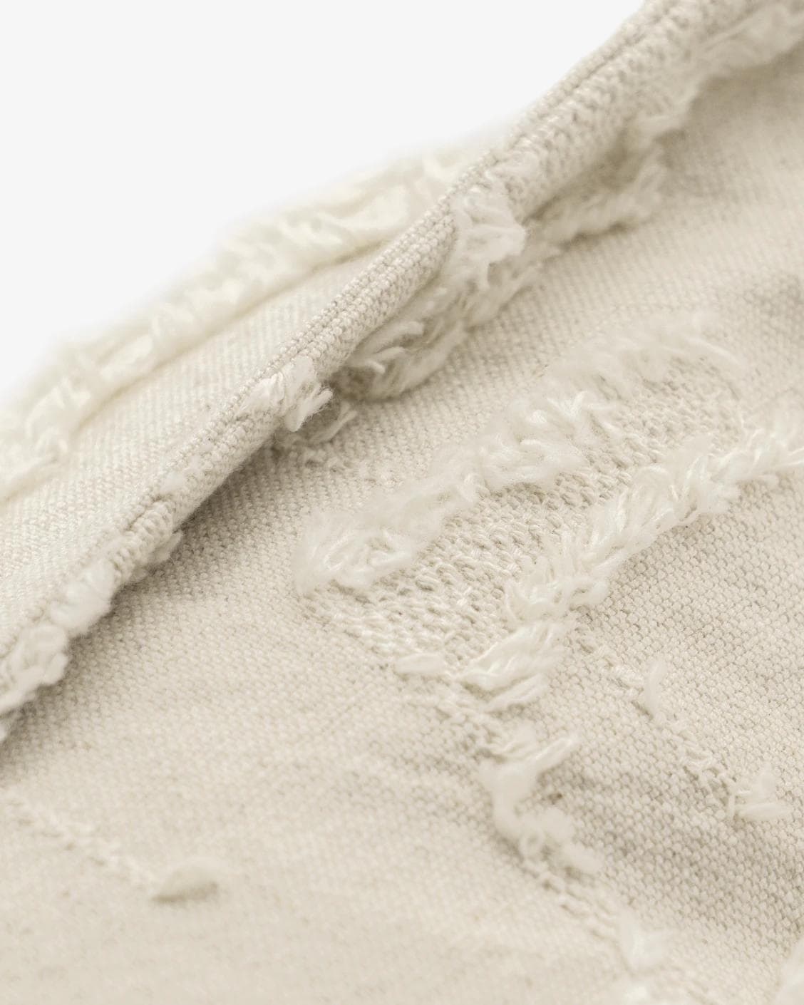 Heeth Laurent cushion in cream and ivory, shown in a product close-up as image 7