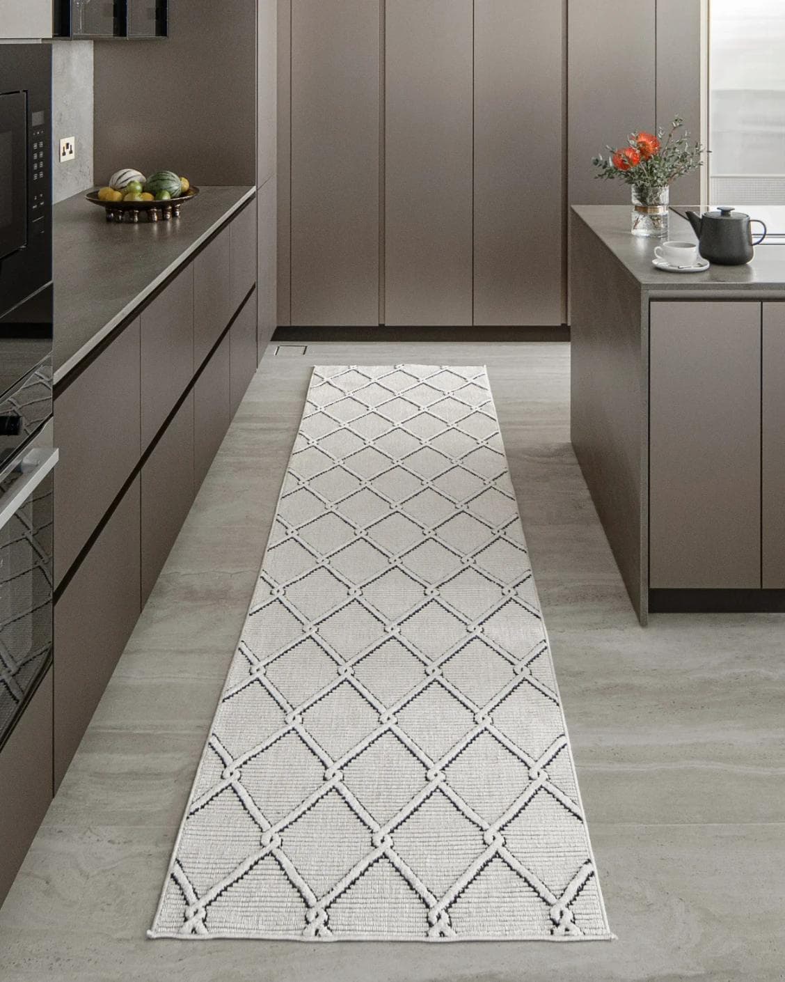 Henry Dusty Runners carpet in ivory and charcoal, shown in a lifestyle front view