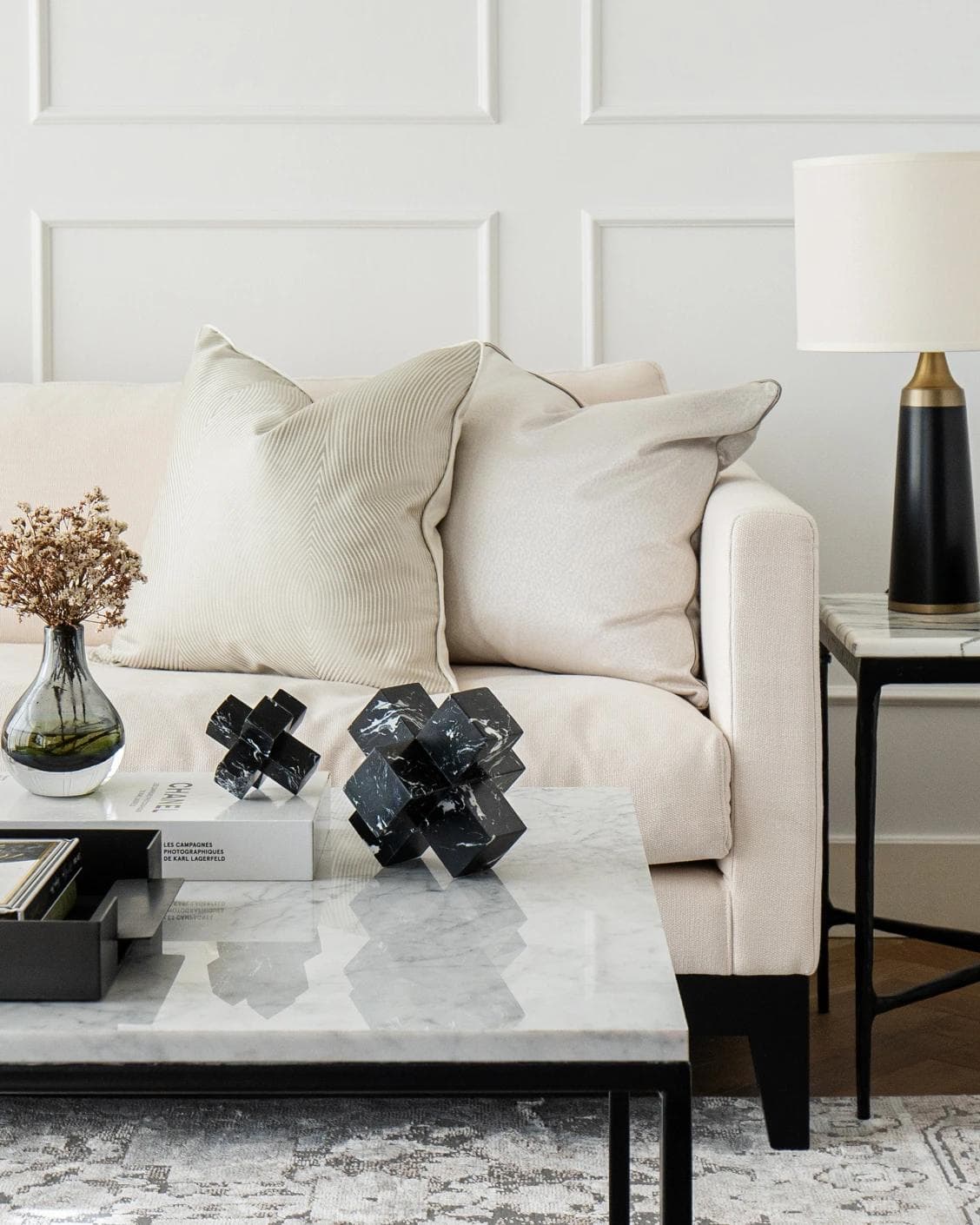 Herman Ellis statues and sculptures in black, shown in a lifestyle front view as image 4