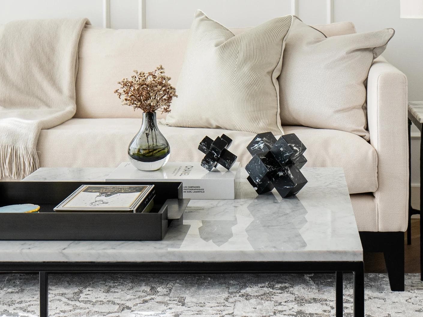 Herman Ellis statues and sculptures in black, shown in a lifestyle front view as image 4