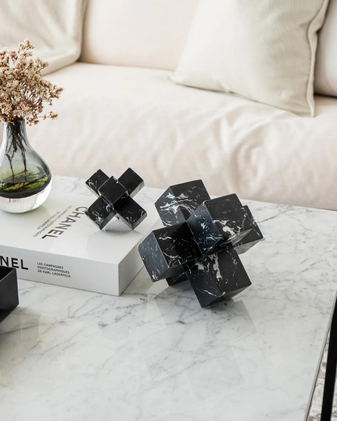 Herman Ellis statues and sculptures in black, shown in a lifestyle front view as image 5