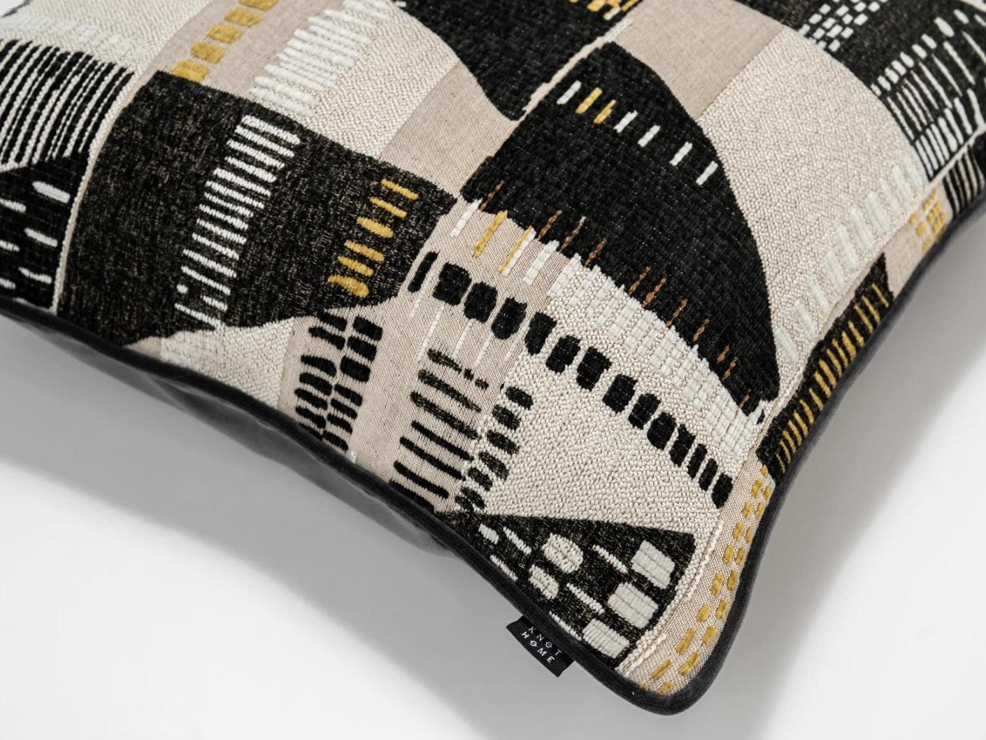 Hilda Steele cushion in black and beige, shown in a product top view as image 8