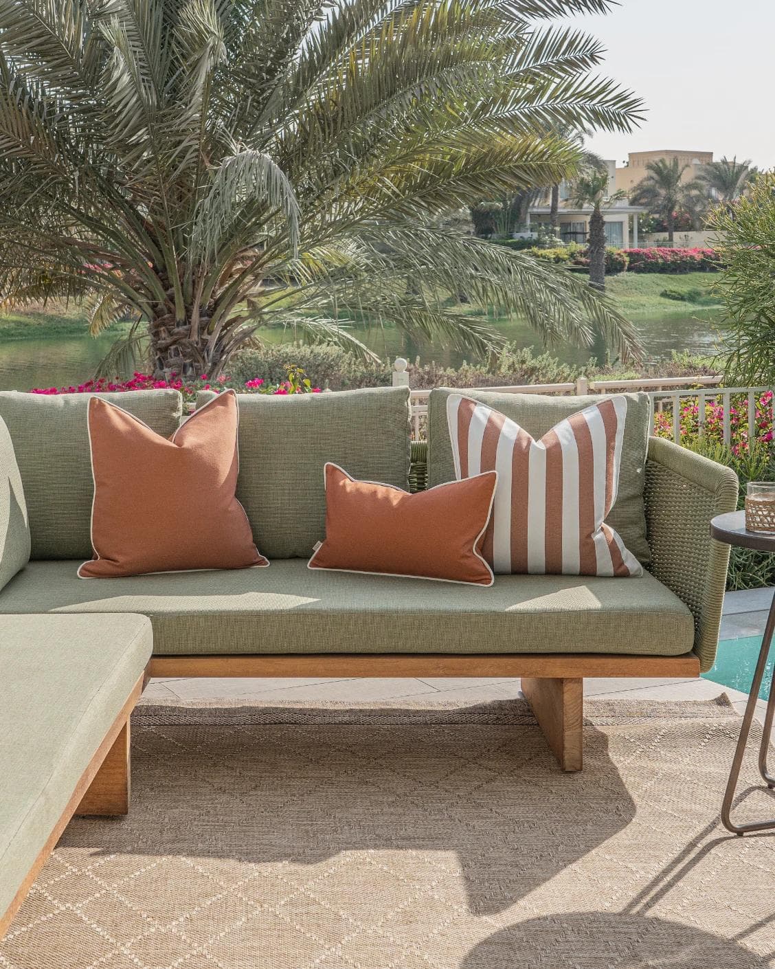 Hisao Bundle cushion in rust, shown in a lifestyle front view as image 4