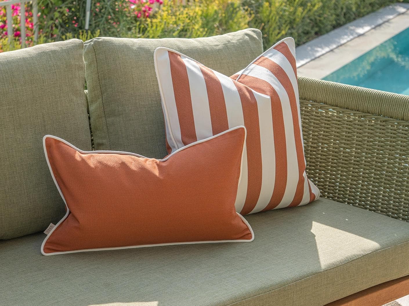 Hisao Bundle cushion in rust, shown in a lifestyle left view as image 6