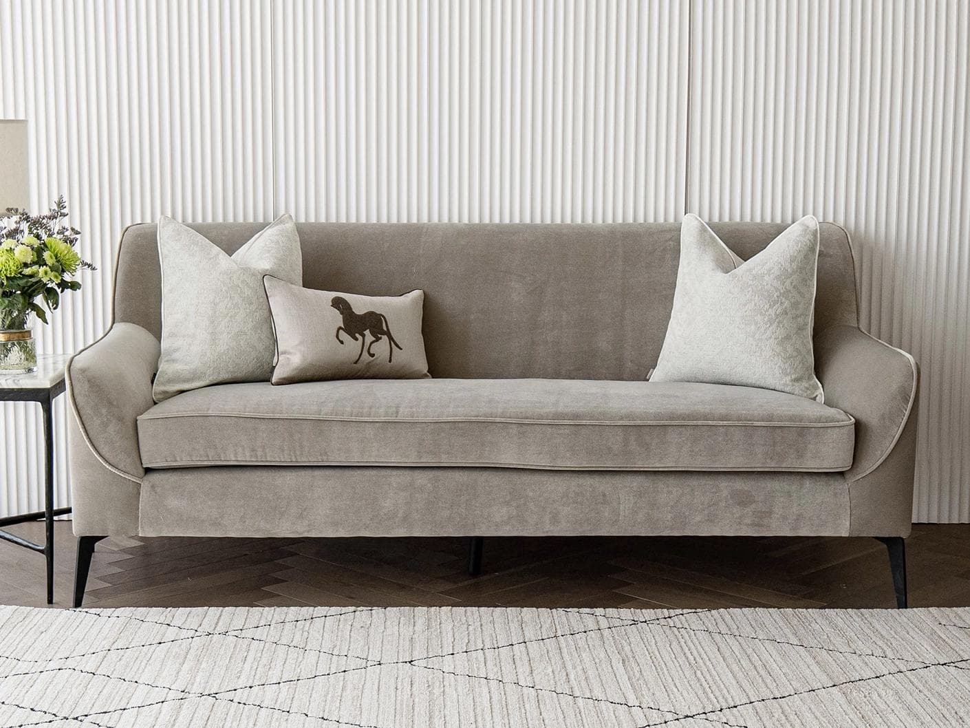 Luther Bundle cushion in white, brown and beige, shown in a lifestyle front view as image 4