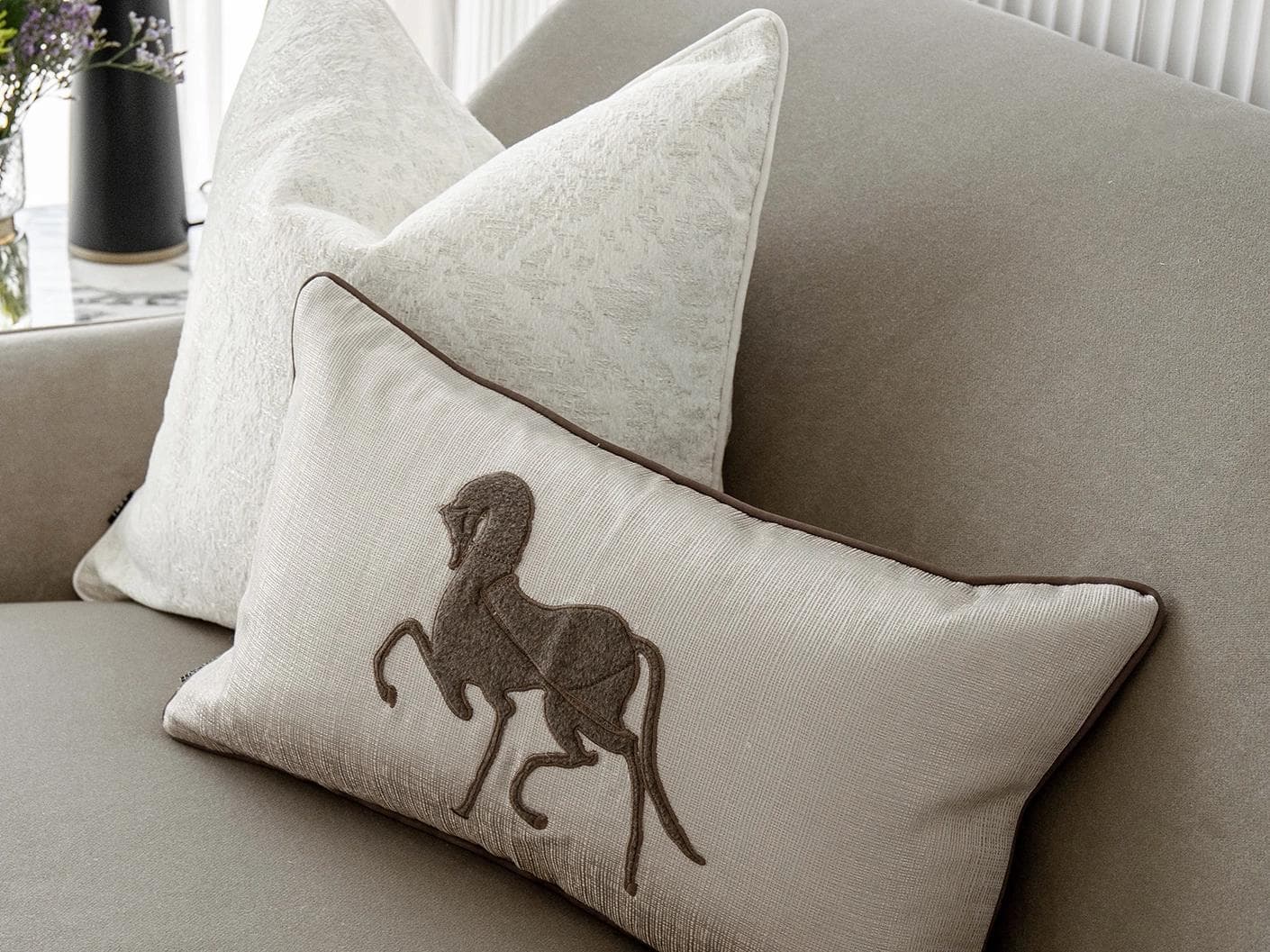 Luther Bundle cushion in white, brown and beige, shown in a lifestyle right view as image 5