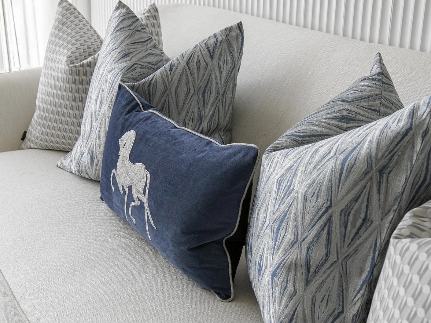 Edwin Bundle bundle - indoor in blue, silver and white, shown in a lifestyle right view as image 3